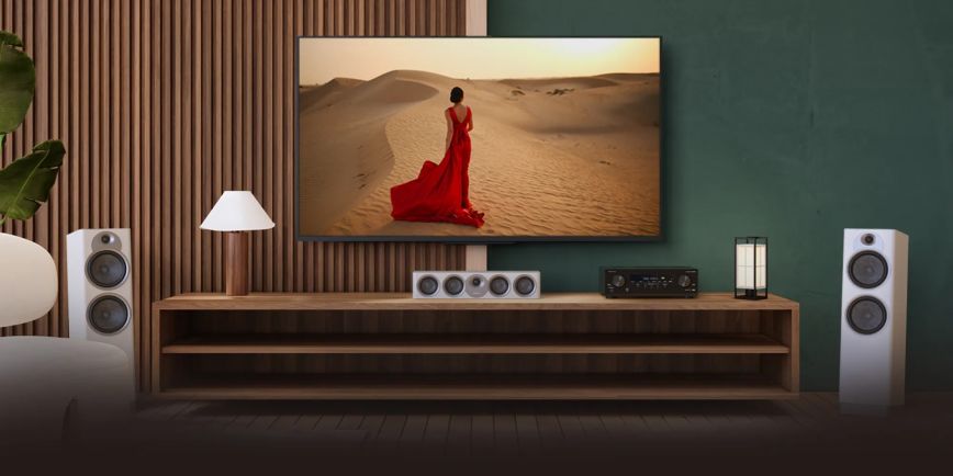 pioneer_vsx_835_powering_home_jamo_system_with_red_dress_woman_on_tv_2000x1000.jpg