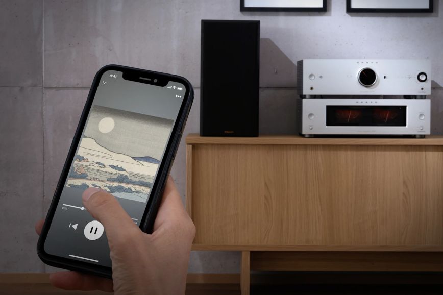onkyo_icon_p_80_m_80_with_phone_controlling_music_in_foreground_2000x1333.jpg
