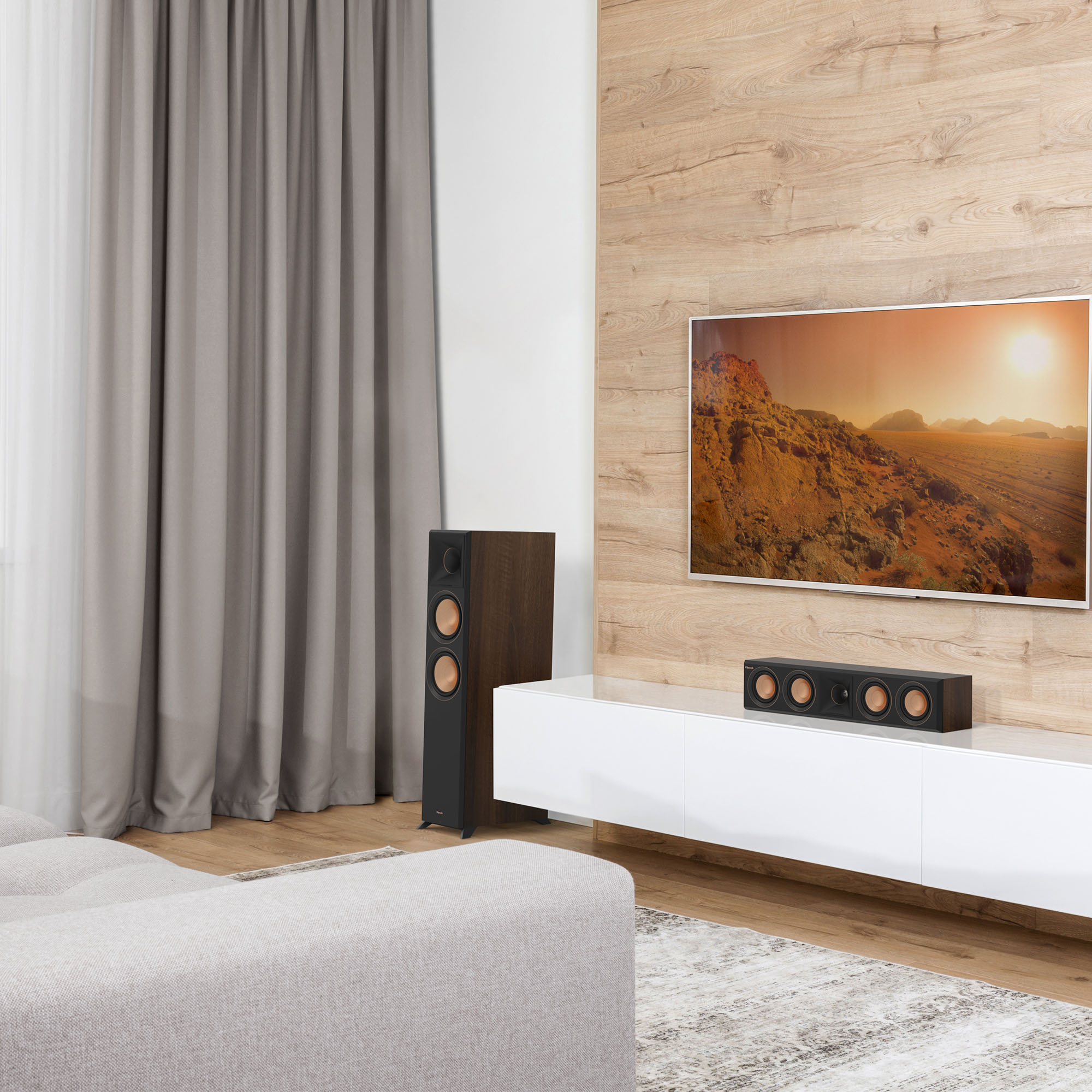 rp_404c_ii_sitting_on_a_white_credenza_under_a_tv_with_its_grille_off.jpg