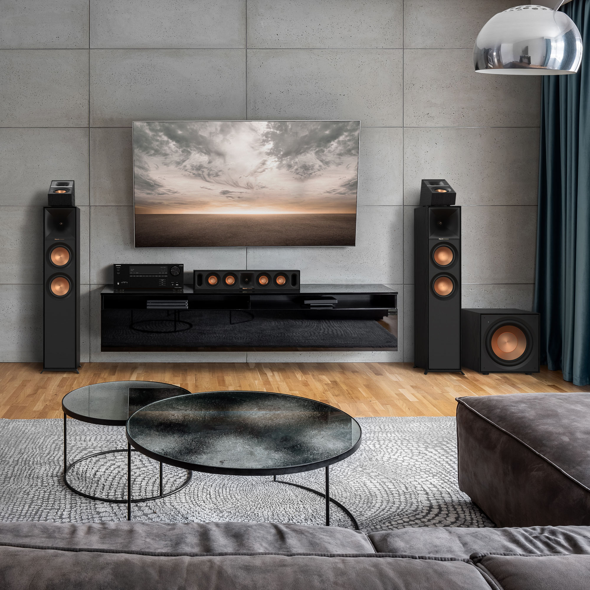 klipsch_r_101sw_subwoofer_in_a_home_theater_setting_with_grilles_off_6.jpg